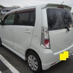 レディースワンオーナー車H22年スズキワゴンRスティングレー車検２年付き純正ナビの画像