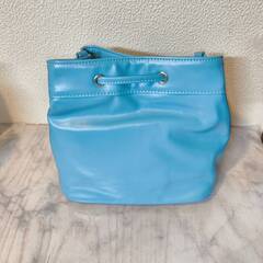 お値下げ致しました。ティピィカレン ハンドバッグ ブルー レオパード ティピィカレン HI ブルー レオパード ドローストリングバッグの画像