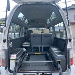 総額55.0万円★車いす移動車★スローパー★福祉車両★トランポ★オートクローザー左右★リヤAC★キーレス★平成15年式 日産キャラバン4WD 車いす移動車(DWGE25改)ディーゼル3000cc10人乗15.2万キロ ホワイトの画像