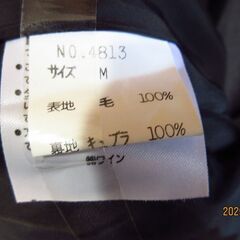 薄手のウールコートの画像