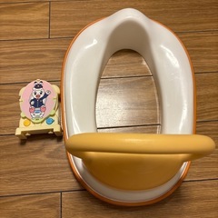 しまじろうのトイ列車と補助便座の画像