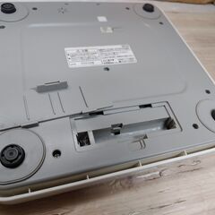 体重計　タニタ デジタルヘルスメーター ホワイト HD-661-WH 　●薄さ35mmで収納に便利●持ち運びに便利な軽量設計(990g)●乗るとスイッチが入るステップオンタイプの画像