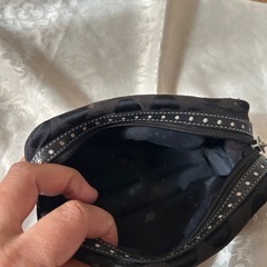 ⭐︎coach（コーチ）のポーチ正規店購入の画像