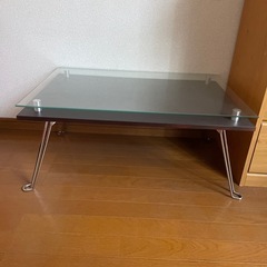 折りたたみ ガラステーブルの画像