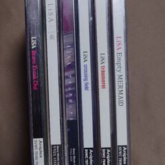 LiSAのCD・DVD6点　東京神奈川で取引　1点なら150円　ただし750円以上から取引します。　希望者には2枚目以降の写真の商品も無料でお付けできます。　他の有料商品とまとめ買いの場合、割引します。の画像