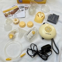 medela swing シングル　電動母乳搾乳器 + 乳頭保護器 + 母乳ポンプの画像