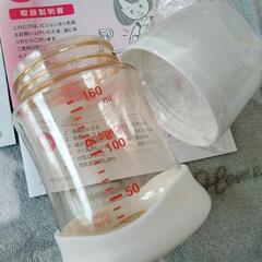 Pigeonの手動搾乳器と中古の哺乳瓶4本の画像