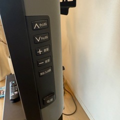 テレビ、テレビ台、ファイアTVセットの画像