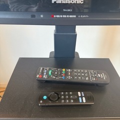 テレビ、テレビ台、ファイアTVセットの画像