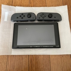任天堂Switch本体とソフト2本の画像