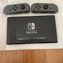 任天堂Switch本体とソフト2本の画像