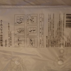 通気窓付き レインコート　セブンイレブンの画像