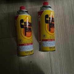 卓上ガスコンロとボンベの画像