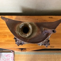 2頭の面シーサーがついた大きな抱瓶の置物の画像