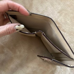 COACH花柄三つ折り財布の画像