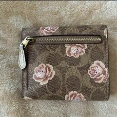 COACH花柄三つ折り財布の画像