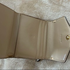 COACH花柄三つ折り財布の画像