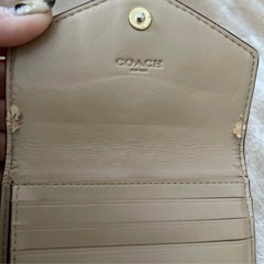 COACH花柄三つ折り財布の画像