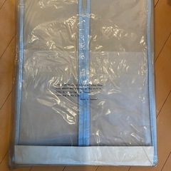 洋服の収納袋の画像