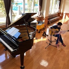 ピアノとギターの弾き合い会の画像