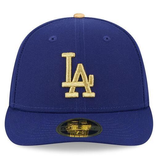ネイビーゴールドのLAキャップ、ワールドシリーズチャンピオンロゴ付き。Los Angeles Dodgers New Era Roya