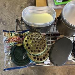 飯ごうと蚊取り線香の画像
