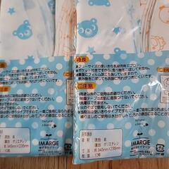 使い捨てエプロン約２０枚&使い捨て防水シーツの画像