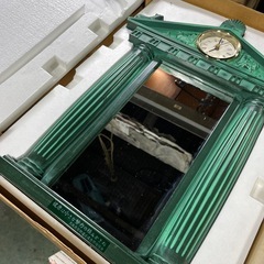話し中差し上げます。時計付き鏡の画像