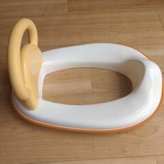 取っ手付きの補助便座の画像