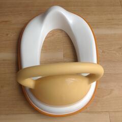 取っ手付きの補助便座