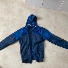 ネイビー フード付きウィンドブレーカーの画像