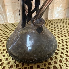〈交渉中〉ガラスの花の置物の画像