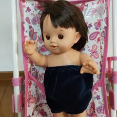 ベビーカーとぽぽちゃん人形の画像