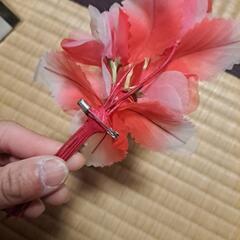 ピンク系のコサージュの画像