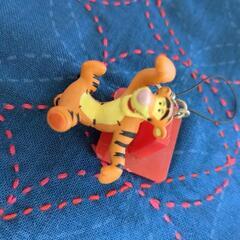 ミッフィーのキーホルダーとディガーのストラップの画像