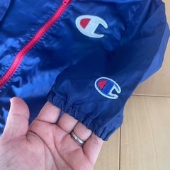 Champion フード付きジャケット ネイビー/レッドの画像