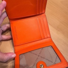 MICHAEL KORS オレンジ 三つ折り財布の画像