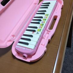 鍵盤ハーモニカ　女の子　小学生の画像