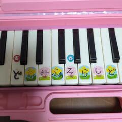 鍵盤ハーモニカ　女の子　小学生の画像