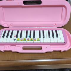 鍵盤ハーモニカ　女の子　小学生の画像