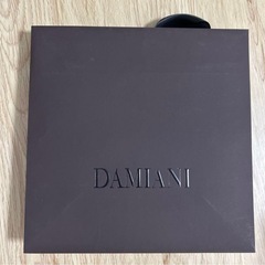 DAMIANI ブラウン 紙袋 リボン付きの画像