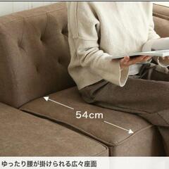 1人用ソファー オットマンとクッション付きの画像
