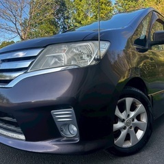 8人乗り☆月々1.1万円〜分割払い可❗️車検2年付き！大人気☆日産 セレナ ハイウェイスター☆8人乗り☆Bluetooth対応ナビ☆走行中DVD見れます☆便利なバックカメラ☆ドラレコ付きのフル装備☆両側電動スライドドア☆クルーズコントロール搭載☆ウィンカーミラー☆フル装備☆事故修復歴無し☆車内広々三列シート‼️の画像