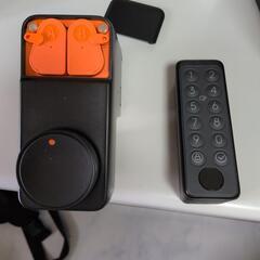 SwitchBot指紋認証キーパッドとジャンクのロックプロの画像