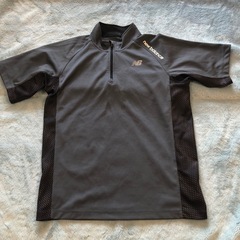 new balance ハーフジップシャツ