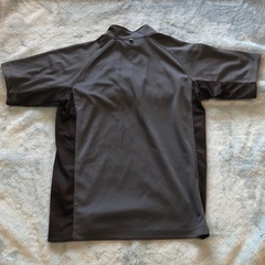 new balance ハーフジップシャツの画像