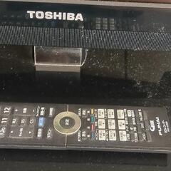 映像が映らない55インチテレビと壊れた洗濯機