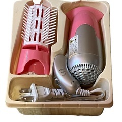 ピンク ハンドヘルド ヘアドライヤーの画像