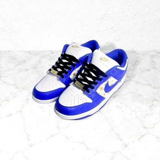 Supreme × Nike SB Dunk Low OG QS Gold Stars 