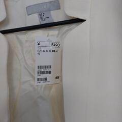 H & M オフホワイトのジャケットの画像